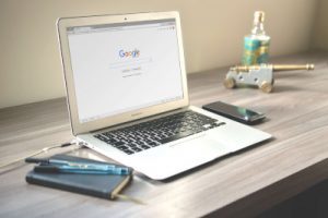 A laptop open to Google, symbolizing the way that recruiters search for the top linkedin keywords to find candidates like on a search engine.