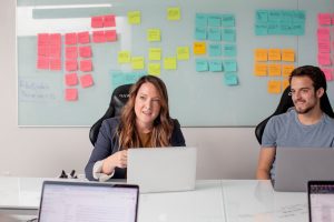 A stock photo of a businesswoman in a meeting, used to represent the nature of a headhunter's job. courtesy of LinkedIn Sales Navigator