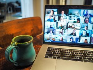 Coffee mug and Zoom. Photo by Chris Montgomery on Unsplash