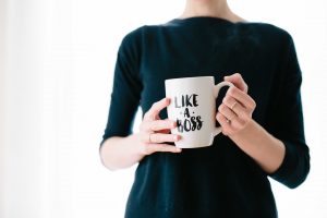 Reflect on woman holding coffee mugPhoto by Brooke Lark on Unsplash