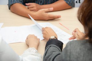 person looking at documents