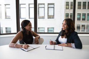 two women talking at a job interview