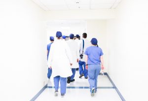 nurses leaving the workplace. Photo by Photo by Luis Melendez on Unsplash   