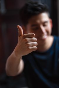 man giving a thumbs up to a LinkedIn skill