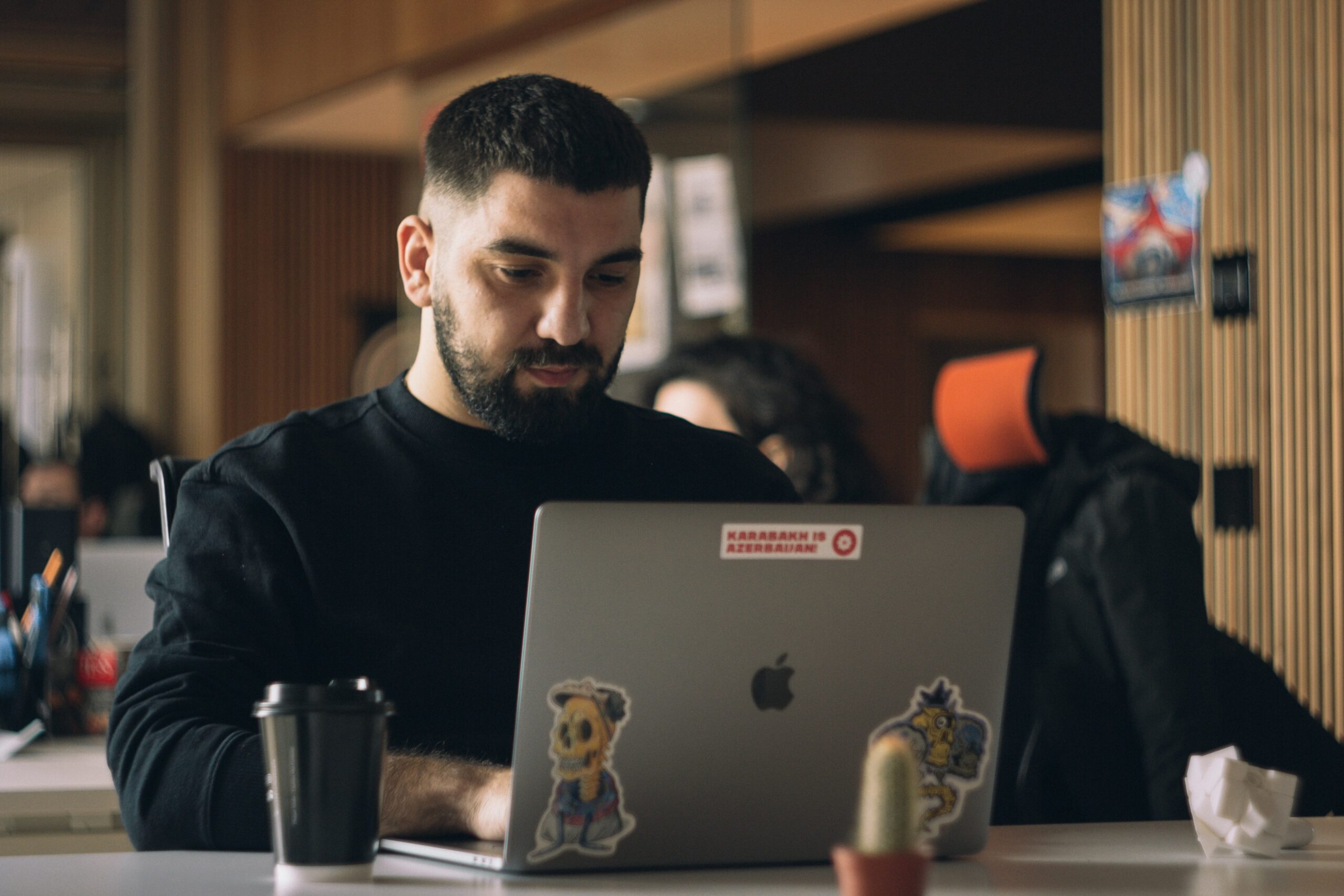 man looking at computer