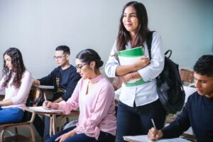 woman standing up in class