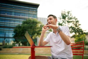 person on phone in park