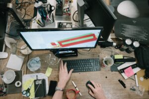 person  with messy desk