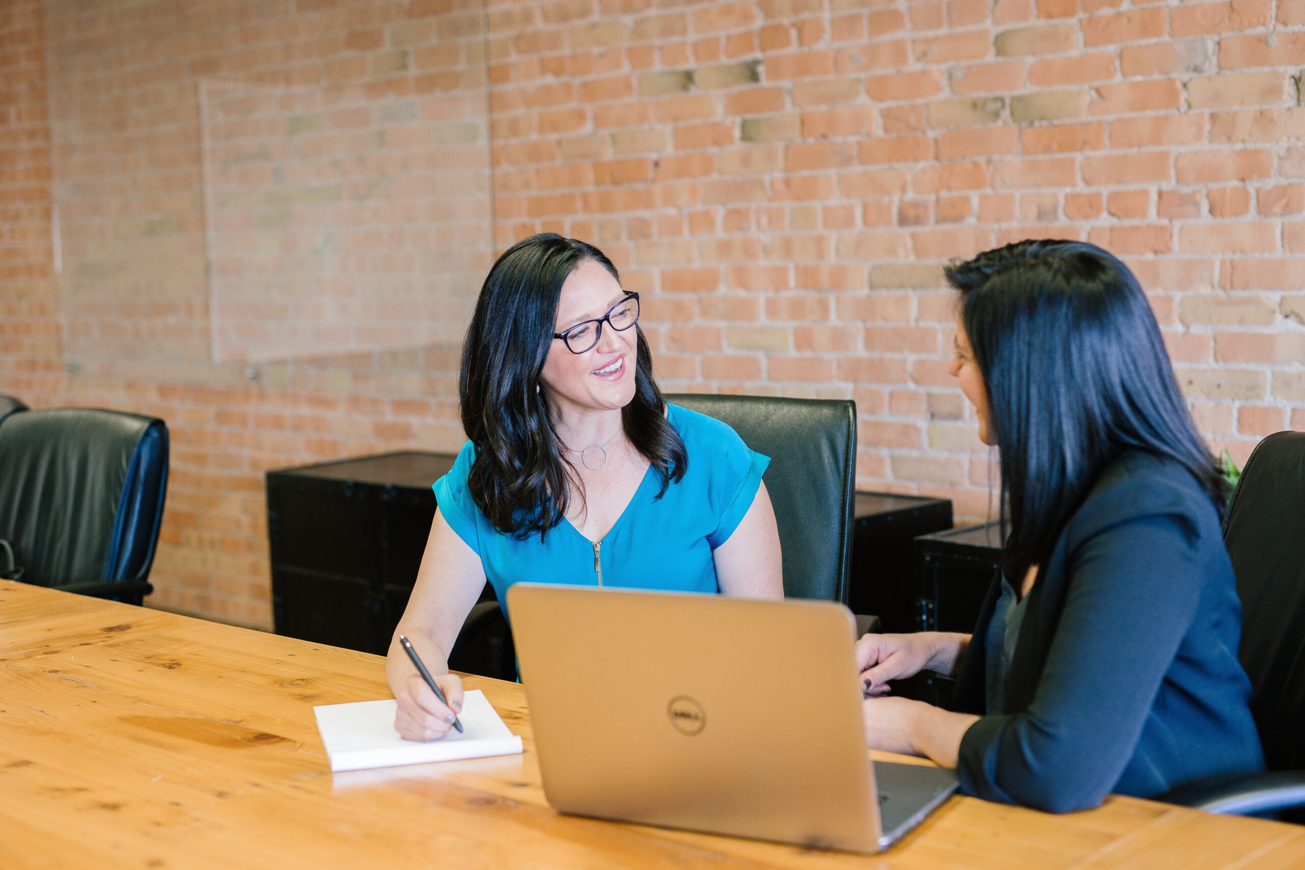 two women in a meeting