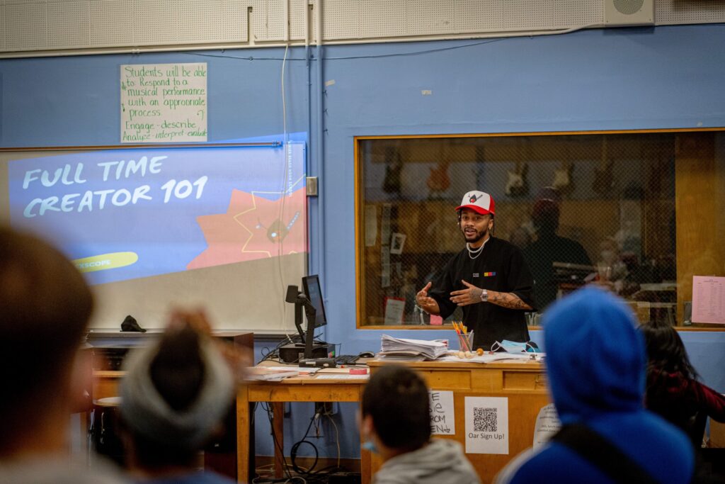 man teaching in front of class